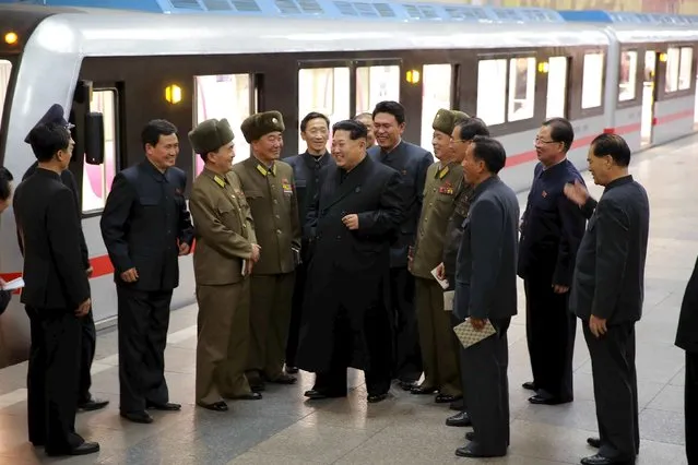 North Korean leader Kim Jong Un looks around a newly manufactured subway train at a station in Pyongyang in this undated photo released by North Korea's Korean Central News Agency (KCNA) on November 20, 2015. (Photo by Reuters/KCNA)