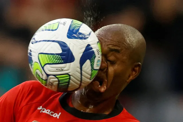 Athletico Paranaense's Fernandinho in action as the ball strikes his face during the Athletico Paranaense v Flamengo match at Arena da Baixada in Curitiba, Brazil on May 7, 2023. (Photo by Rodolfo Buhrer/Reuters)