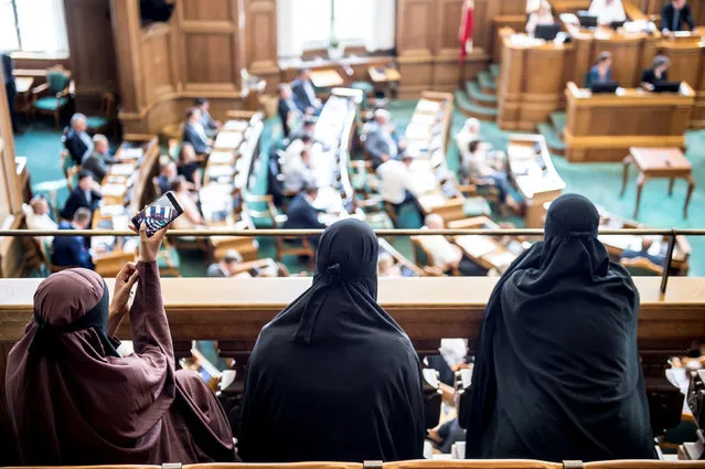 Women in niqab are pictured after the Danish Parliament banned the wearing of face veils in public, at Christiansborg Palace in Copenhagen, Denmark, May 31, 2018. (Photo by Mads Claus Rasmussen/Reuters/Ritzau Scanpix)