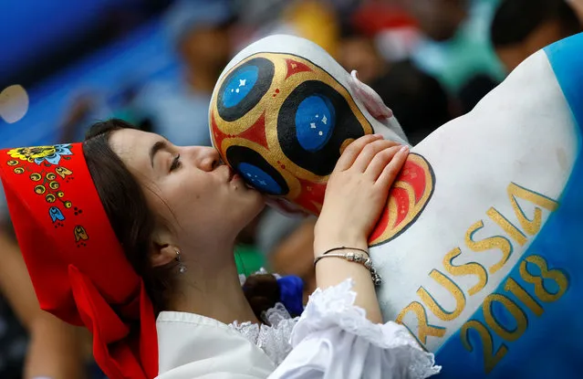 A Russia fan with body paint before the Russia 2018 World Cup Group A football match between Russia and Saudi Arabia at the Luzhniki Stadium in Moscow on June 14, 2018. (Photo by Kai Pfaffenbach/Reuters)