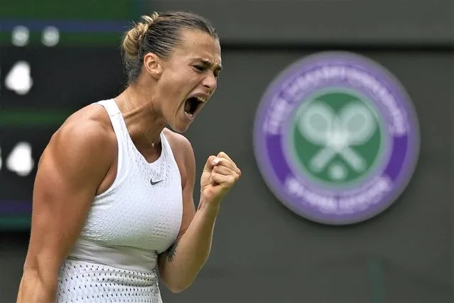 Aryna Sabalenka of Belarus celebrates winning a game against Madison Keys of the US during the women's singles match on day ten of the Wimbledon tennis championships in London, Wednesday, July 12, 2023. (Photo by Alastair Grant/AP Photo)
