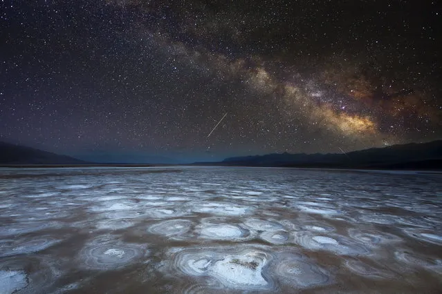 This photo look like were taken on a distant planet but were in fact taken at the Death Valley National Park in California, USA in May 2023. The photo were captured by businessman Phillip Chang by merging two images taken from the same location together – the ground captured during the day and the stars taken at night. (Photo byPhillip Chang/Solent News & Photo Agency)