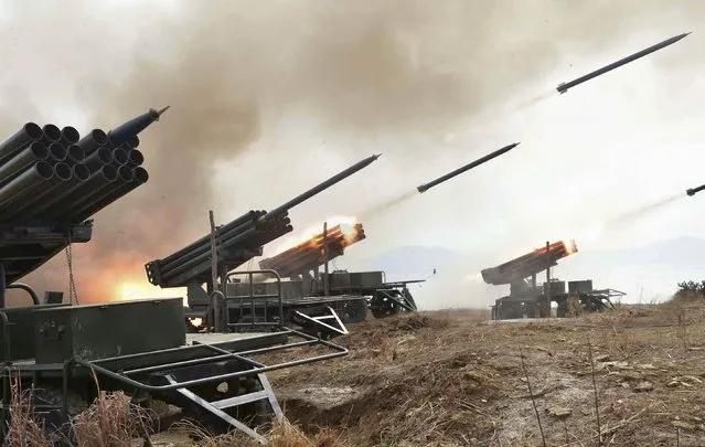 A view of artillery fire and landing exercises guided by North Korean leader Kim Jong Un (not seen) in this undated photo released by North Korea's Korean Central News Agency (KCNA) in Pyongyang February 21, 2015. (Photo by Reuters/KCNA)