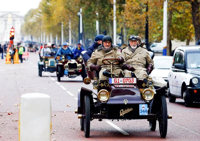 Participants in the London to Brighton Veteran Car Run make their way down The Mall, in London, Britain November 4, 2018. (Photo by Henry Nicholls/Reuters)