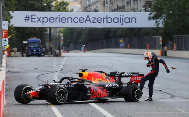 Red Bull's Max Verstappen kicks the wheel of his car after crashing out of the Azerbaijan Grand Prix at Baku City Circuit in Baku, Azerbaijan, June 6, 2021. (Photo by Anton Vaganov/Reuters)