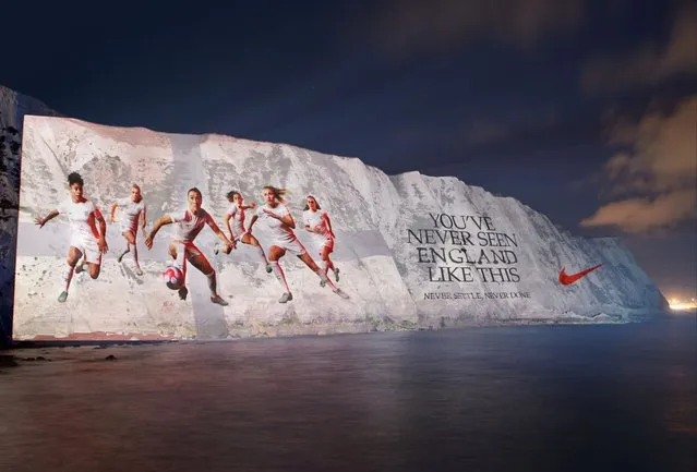 In this handout image provided by Nike and released on July 3, Nike celebrate the footballing brilliance of Leah Williamson, Lucy Bronze, Demi Stokes, Georgia Stanway, Keira Walsh and Lauren Hemp by lighting up the White Cliffs of Dover ahead of the European Championships on July 01, 2022 in London, England. (Photo by Handout/Getty Images for Nike)
