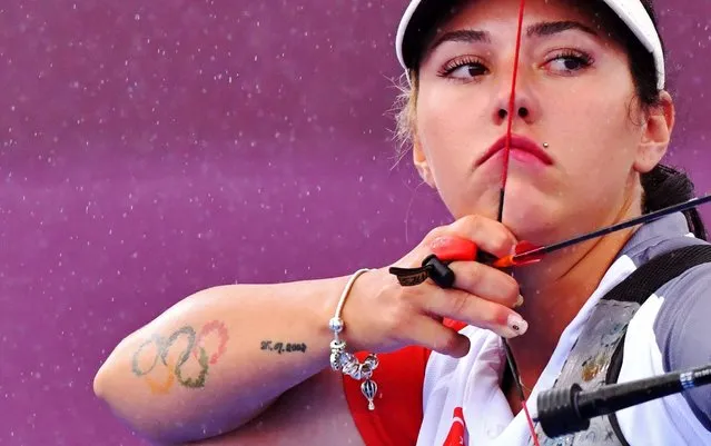 Yasemin Anagoz of Team Turkey competes in the 1/16 Eliminations round on day four of the Tokyo 2020 Olympic Games at Yumenoshima Park Archery Field on July 27, 2021 in Tokyo, Japan. (Photo by Clodagh Kilcoyne/Reuters)