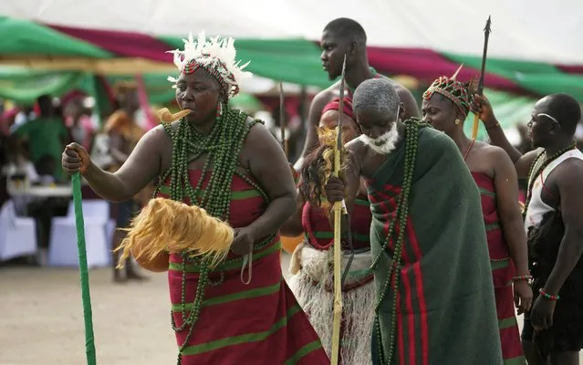 People dressed in traditional clothes perform, during the annual celebration of the Berom tribes, in Lagos Nigeria, Sunday, December 3, 2023. (Photo by Sunday Alamba/AP Photo)