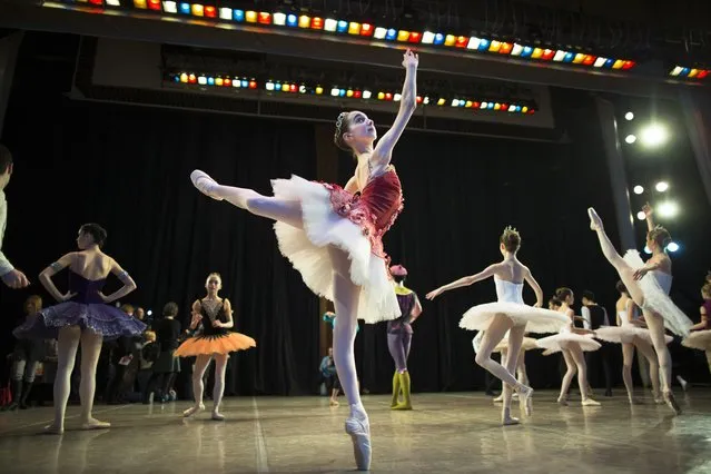 In this photo taken on Thursday, March  3, 2016, Harper Ortlieb, from Mount Hood, Oregon, warms up for a performance at the Bolshoi Ballet Academy in Moscow, Russia. (Photo by Alexander Zemlianichenko/AP Photo)