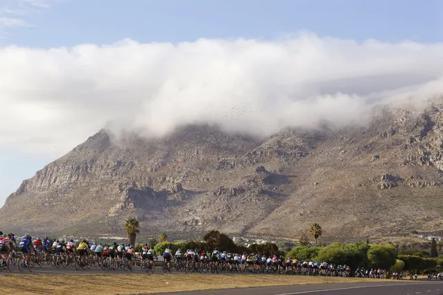Participants make their way during the Cape Town Cycle Tour in Cape Town, South Africa, Sunday, March  6, 2016. Around 35,000 people took part in the yearly cycle tour. (Photo by Schalk van Zuydam/AP Photo)