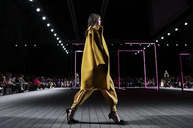 A model displays a creation by Portuguese designer Carlos Gil on the second day of the Lisbon Fashion Week, at the Carlos Lopes Pavillion in Lisbon, Portugal, 09 March 2019. (Photo by Miguel A. Lopes/EPA/EFE)