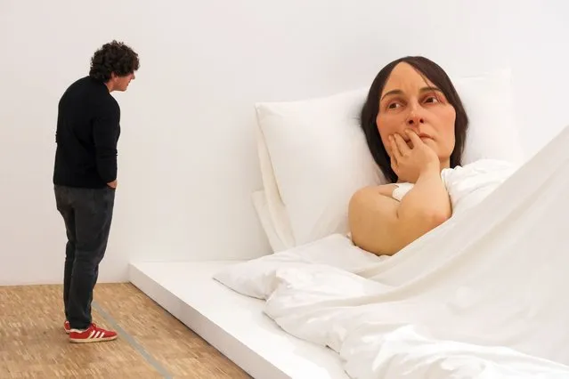 Visitors look at the work titled “In Bed”, 2005 by Australian-born artist Ron Mueck at Triennale di Milano on January 09, 2024 in Milan, Italy. (Photo by Giuseppe Cottini/Getty Images)