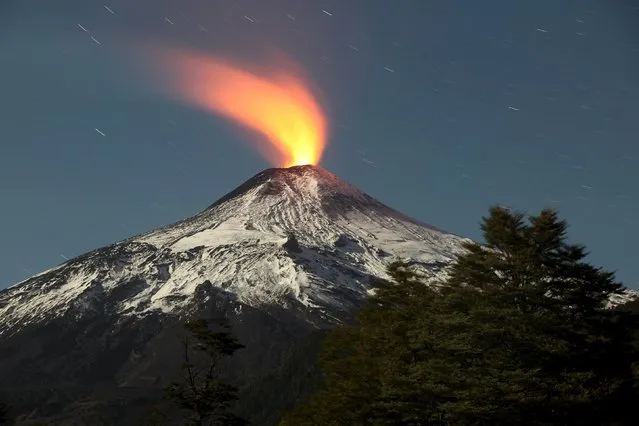 The Villarrica Volcano is seen at night in Pucon town, Chile May 5, 2015. Picture taken May 5, 2015. (Photo by Cristobal Saavedra/Reuters)