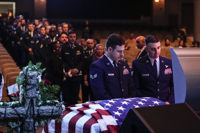 U.S. Air Force personel stand near the coffin of slain airman Roger Fortson during his funeral at New Birth Missionary Baptist Church, Friday, May 17, 2024, near Atlanta. (Photo by Brynn Anderson/AP Photo)