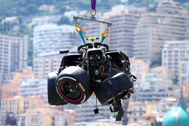 The car of Sergio Perez of Mexico and Oracle Red Bull Racing is recovered from the track after crashing during the F1 Grand Prix of Monaco at Circuit de Monaco on May 26, 2024 in Monte-Carlo, Monaco. (Photo by Clive Rose/Getty Images)