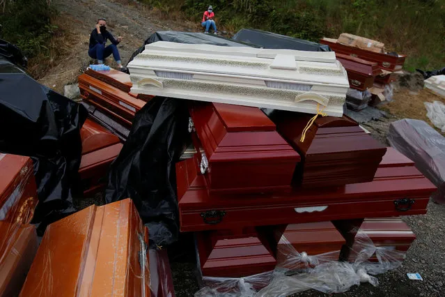 New coffins for reburials, are seen in a cemetery after flooding and mudslides caused by heavy rains leading several rivers to overflow, pushing sediment and rocks into buildings and roads, in Mocoa, Colombia April 3, 2017. (Photo by Jaime Saldarriaga/Reuters)