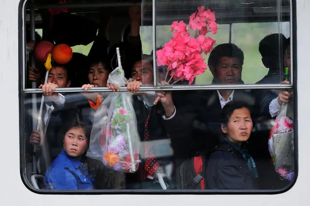 People travel on a tram in central Pyongyang, North Korea May 4, 2016. (Photo by Damir Sagolj/Reuters)