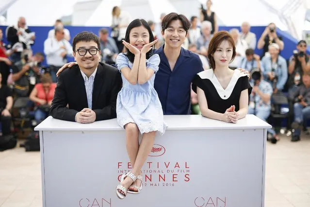 (L-R) South-Korean director Yeon Sang-Ho, South-Korean actress Kim Su-An, South-Korean actor Gong Yoo and South-Korean actress Jung Yu-Mi pose during the photocall for “Bu-San-Haeng” (Train to Busan)  at the 69th annual Cannes Film Festival, in Cannes, France, 14 May 2016. The movie is presented out of competition at the festival which runs from 11 to 22 May. (Photo by Julien Warnand/EPA)