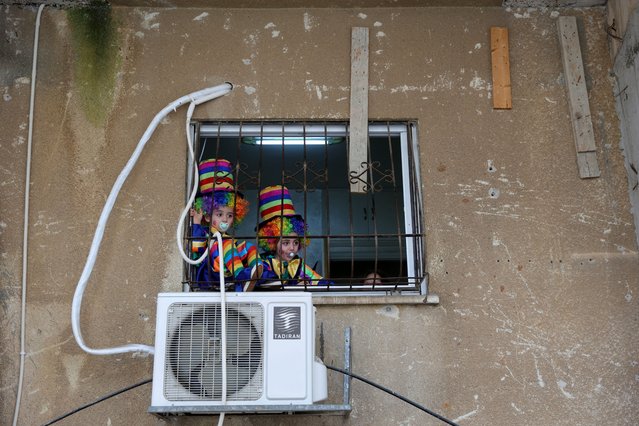 Ultra Orthodox Jews in costume celebrate the Jewish holiday of Purim in Bnei Brak, Israel, 07 March 2023. Purim celebrates the Jews' salvation from genocide in ancient Persia, as recounted in the Scroll of Esther, and is marked with public celebrations. (Photo by Abir Sultan/EPA/EFE)