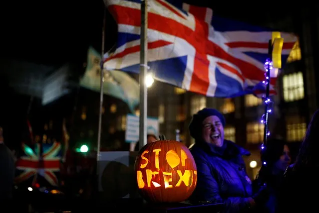 A pumpkin with “Stop Brexit” engraving sits outside the Houses of Parliament in London, Britain on October 29, 2019. (Photo by Henry Nicholls/Reuters)