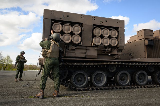 Militaries of the 1st artillery regiment prepare a LRU vehicule (Lance Roquettes Unitaire) to shoot in Bourogne, eastern France, on April 20, 2023. (Photo by Sebastien Bozon/AFP Photo)