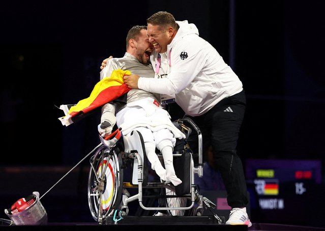 Germany's Maurice Schmidt celebrates winning the men's sabre category A Gold medal bout at Paris 2024 Paralympic Games at the Grand Palais in Paris, on September 3, 2024. (Photo by Eng Chin An/Reuters)