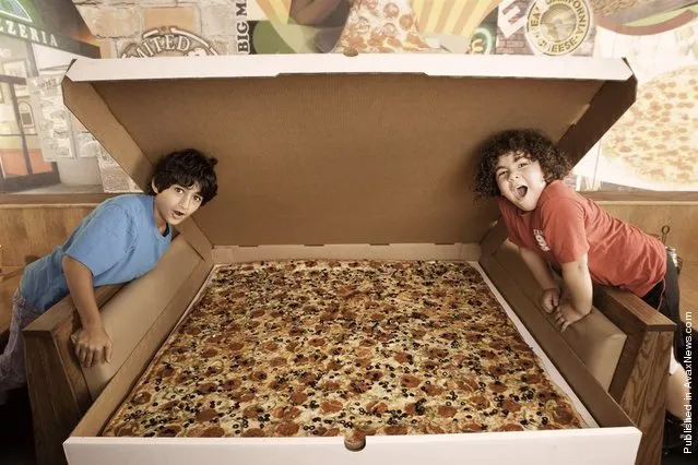 Available on the menu at Big Mama's and Papa's Pizzeria in Los Angeles, California, is an enormous four foot, six inch square pizza. Retailing at $199.99 plus tax, this mammoth meal can feed up to 100 people and can be ordered for delivery as long as you give the pizzeria 24 hours' notice