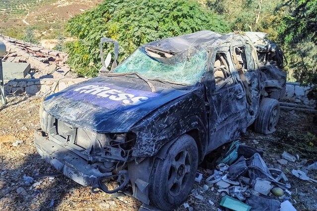 A view shows a damaged Press vehicle at the site of an Israeli strike that killed few media staff staying at a guesthouse where several other reporters were staying, Lebanese media said, in Hasbaya, Lebanon on October 25, 2024. (Photo by Reuters/Stringer)