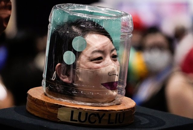 A cosplayer dressed as the actress Lucy Liu, as depicted in the animated series Futurama, poses for a photo at Comic-Con International in San Diego, California, U.S., July 23, 2022. (Photo by Bing Guan/Reuters)