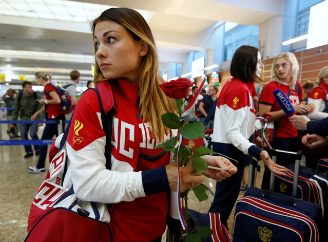 Russia's women's handball Olympic team member Sudakova waits for check-in before national team's departure to 2016 Rio Olympics at Sheremetyevo Airport outside Moscow, Russia, July 28, 2016. (Photo by Sergei Karpukhin/Reuters)