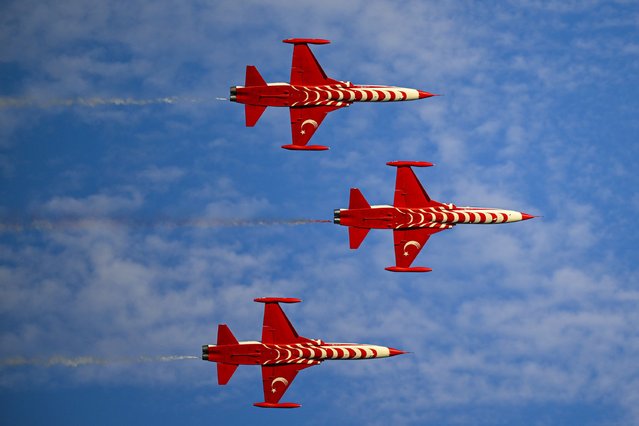 Turkish Stars, the acrobatic team of the Turkish Air Forces perform a flight around Mogan Lake during the celebrations of 102nd anniversary of Victory Day and Turkish Armed Forces Day in Ankara, Turkiye on August 30, 2024. (Photo by Hakan Nural/Anadolu via Getty Images)