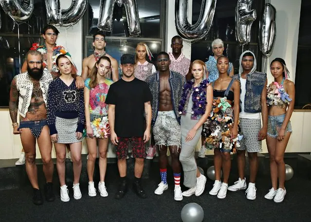 Models pose with designer Kyle Brincefield (C) at the Studmuffin NYC Presentation – Spring 2016 during New York Fashion Week on September 10, 2015 in New York City. (Photo by Cindy Ord/Getty Images)