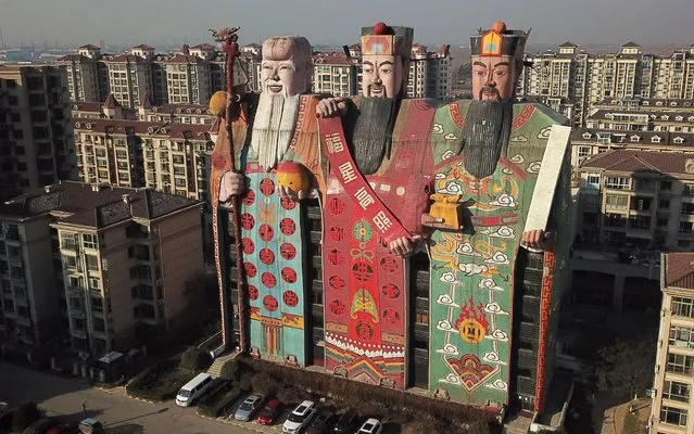 The Tianzi Hotel with the shape of Chinese deities Fu, Lu and Shou is pictured on November 20, 2017 in Langfang, Hebei Province of China. The 41.6-meter-tall Tianzi Hotel has an exterior of Chinese Sanxing, whose names are Fu, Lu and Shou with the qualities of prosperity, status and longevity in traditional Chinese culture, in Langfang city. (Photo by VCG/VCG via Getty Images)