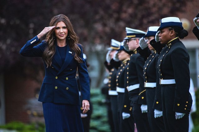 US Secretary of Homeland Security Kristi Noem reviews the troops as she attends the US Coast Guard Academy's 144th Commencement in New London, Connecticut, on May 21, 2025. (Photo by Joseph Prezioso/AFP Photo)
