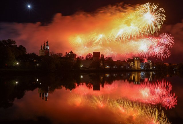 Fireworks explode behind the Novodevichy monastery during celebrations of Victory Day, marking the 80th anniversary of the victory over Nazi Germany in World War Two, in Moscow, Russia on May 9, 2025. (Photo by Marina Lystseva/Reuters)