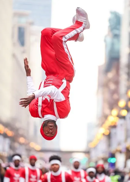 A performer takes part in Chicago Thanksgiving Parade on State Street in Chicago, the United States, on November 24, 2022. (Photo by Xinhua News Agency/Rex Features/Shutterstock)