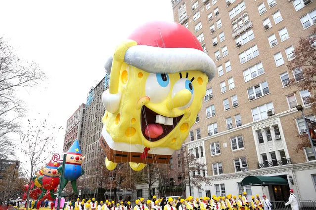 Nickelodeon's Spongebob Squarepants balloon returns for the 88th Annual Macy's Thanksgiving Day Parade on November 27, 2014 in New York City. (Photo by Rob Kim/Getty Images for Nickelodeon)