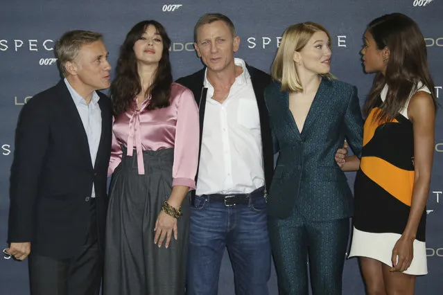 Christoph Waltz, from left to right, Monica Bellucci, Daniel Craig, Lea Seydoux and Naomie Harris, pose for photographers during the photo call for the latest Bond film, "Spectre", at an hotel in central London, Thursday, October 22, 2015. The media blitz ahead of Monday's World Premiere of the movie at the Royal Albert Hall has started in earnest. Craig is reprising his role as the British secret agent for the fourth time. (Photo by Joel Ryan/Invision/AP Photo)