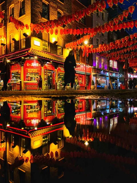 Chinese New Year, London. Urban Life youth winner. The vibrant Chinese lanterns and colours in Chinatown, London celebrating Chinese new year captured in a puddle. (Photo by Olivia Ritchie/UK Landscape Photographer of the Year 2020)