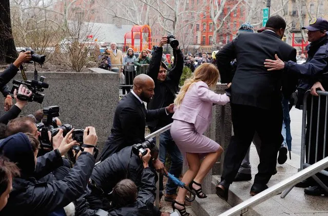 Adult film actress Stormy Daniels (Stephanie Clifford) enters the United States District Court Southern District of New York for a hearing related to Michael Cohen, President Trump's longtime personal attorney and confidante, April 16, 2018 in New York City. Cohen and lawyers representing President Trump are asking the court to block Justice Department officials from reading documents and materials related to Cohen's relationship with President Trump that they believe should be protected by attorney-client privilege. Officials with the FBI, armed with a search warrant, raided Cohen's office and two private residences last week. (Photo by Lucas Jackson/Reuters)