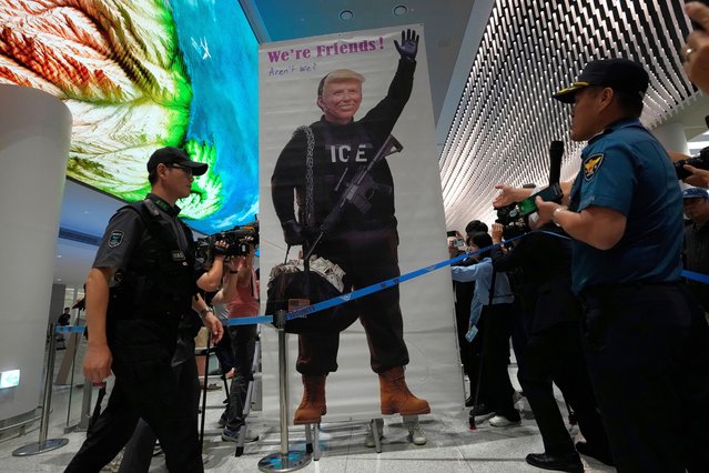 A banner depicting U.S. President Donald Trump is placed by protesters at the arrival terminal of the Incheon International Airport, in Incheon, South Korea, Friday, September 12, 2025. (Phoot by Ahn Young-joon/AP Photo)