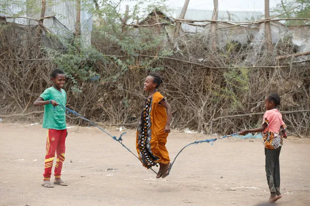 Children jump rope as they play at the Kakuma refugee camp in northern Kenya, March 5, 2018. (Photo by Baz Ratner/Reuters)
