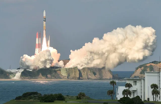 A H-2A rocket carrying Japan Meteorological Agency's new weather satellite “Himawari-9” is launched at Tanegashima Space Center on the Japanese southwestern island of Tanegashima, Kagoshima Prefecture, Japan  November 2, 2016 in this photo taken by Kyodo. (Photo by Reuters/Kyodo News)