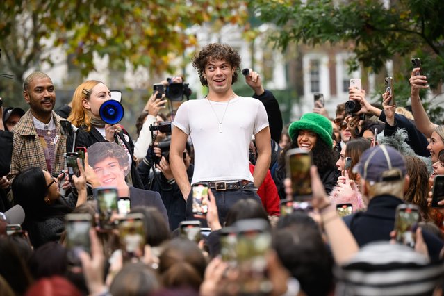 Oscar, the winning contestant in a Harry Styles lookalike competition, is cheered by fans of the former One Direction singer after taking the top prize at Soho Square on November 09, 2024 in London, England. After a Timothee Chalamet lookalike contest in New York went viral after the star gatecrashed the event, similar events have occurred with a Paul Mescal contest in Dublin and today, a Harry Styles event in London's Soho Square. (Photo by Leon Neal/Getty Images)