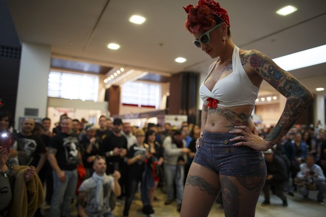 Lucia Moreno, 28, participates in a Miss Tattoo contest during a tattoo convention in the Andalusian capital of Seville February 14, 2015. (Photo by Marcelo del Pozo/Reuters)