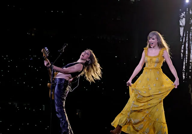 Este Haim of HAIM and Taylor Swift perform onstage during “Taylor Swift | The Eras Tour” at SoFi Stadium on August 09, 2023 in Inglewood, California. (Photo by Kevin Winter/TAS23/Getty Images for TAS Rights Management)