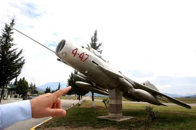 A MiG-19 jet fighter is pictured in Kucova Air Base in Kucova, Albania on October 3, 2018. (Photo by Florion Goga/Reuters)