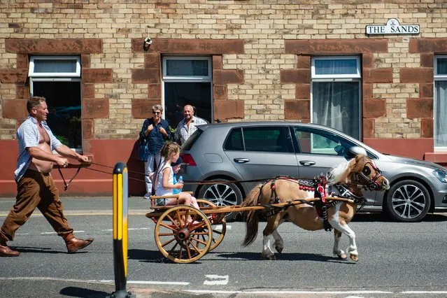 Visitors turn up for the cancelled Appleby Horse Fair, an annual gathering of travellers in Cumbria, a ceremonial and non-metropolitan county in North West England on June 5, 2021. (Photo by WittWooPhoto/Rex Features/Shutterstock)