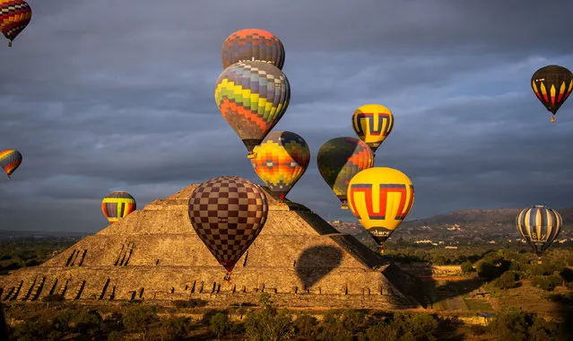 The largest balloon on the entire continent was launched at dawn at the emblematic Archaeological center of the Pyramids of Teotihuacan during one of the largest hot air balloons on the continent on December 16, 2023. (Photo by Jorge Nunez/ZUMA Press Wire/Rex Features/Shutterstock)