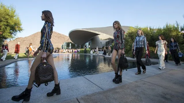 Models present designs from Louis Vuitton's women CRUISE 2016 collection during a fashion show at the estate of entertainer Bob Hope in Palm Springs, California May 6, 2015. (Photo by Mario Anzuoni/Reuters)